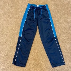 Boys athletic pants size 8. Navy blue with teal
